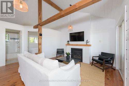 93-44 Potato Island Road, Georgian Bay, ON - Indoor Photo Showing Living Room With Fireplace