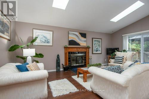 323 Pastern Trail, Waterloo, ON - Indoor Photo Showing Living Room With Fireplace