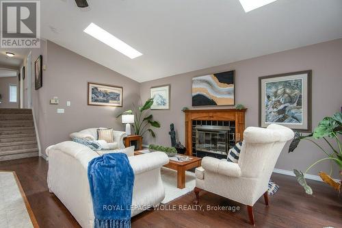 323 Pastern Trail, Waterloo, ON - Indoor Photo Showing Living Room With Fireplace