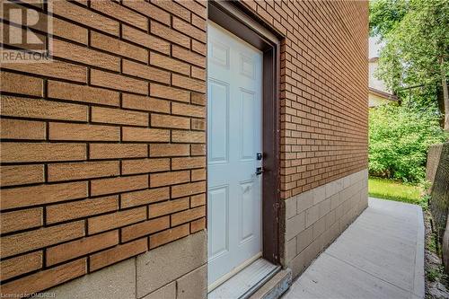 SIDE ENTRANCE TO KITCHEN & BASEMENT - 87 Lottridge Street, Hamilton, ON 