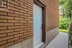 SIDE ENTRANCE TO KITCHEN & BASEMENT - 