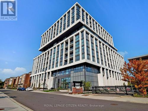 302 - 1063 Douglas Mccurdy Comm, Mississauga, ON - Outdoor With Balcony With Facade