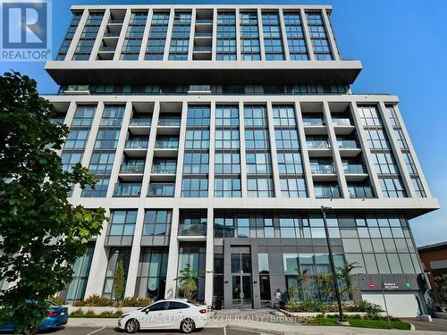 302 - 1063 Douglas Mccurdy Comm, Mississauga, ON - Outdoor With Balcony With Facade