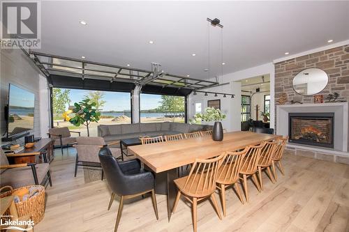 93-44 Potato Island Road, Port Severn, ON - Indoor Photo Showing Dining Room With Fireplace