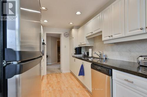 305 - 1903 Pilgrim Way, Oakville, ON - Indoor Photo Showing Kitchen With Double Sink