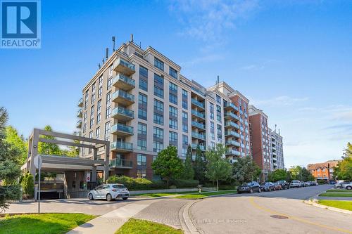 209 - 120 Dallimore Circle, Toronto, ON - Outdoor With Facade