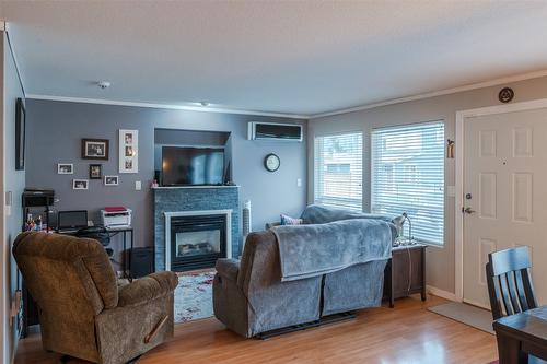 2-607 4Th Street, Keremeos, BC - Indoor Photo Showing Living Room With Fireplace