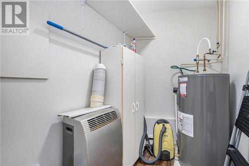 Utility room with Storage in condo - 26 Pearl Street Unit#107, Smiths Falls, ON - Indoor Photo Showing Laundry Room