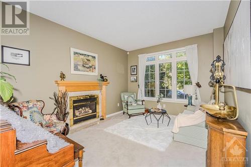 91 Insmill Crescent, Kanata, ON - Indoor Photo Showing Living Room With Fireplace