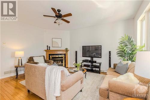 91 Insmill Crescent, Kanata, ON - Indoor Photo Showing Living Room With Fireplace