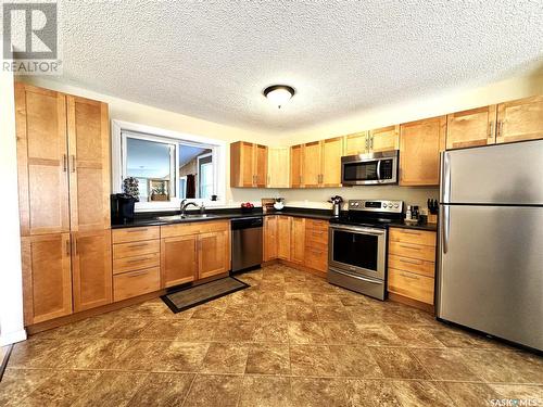 1102 16Th Street, Humboldt, SK - Indoor Photo Showing Kitchen With Double Sink