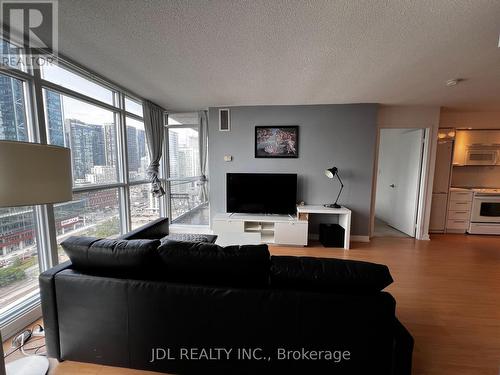 2306 - 25 Capreol Court, Toronto, ON - Indoor Photo Showing Living Room