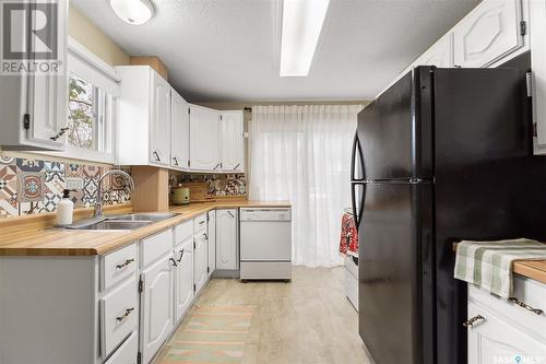 220 Riverside Drive, Prince Albert, SK - Indoor Photo Showing Kitchen With Double Sink