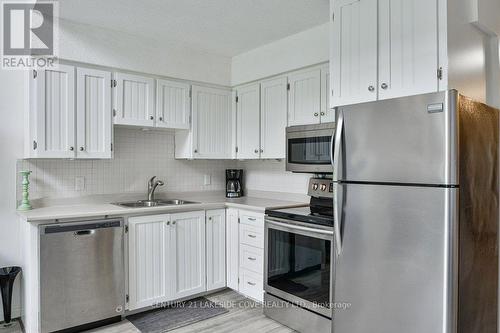 10 - 81 Laguna Parkway N, Ramara, ON - Indoor Photo Showing Kitchen With Double Sink