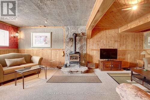 12435 Loyalist Parkway, Prince Edward County, ON - Indoor Photo Showing Living Room With Fireplace