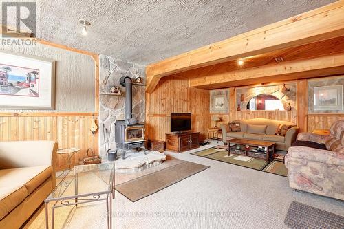 12435 Loyalist Parkway, Prince Edward County, ON - Indoor Photo Showing Living Room With Fireplace