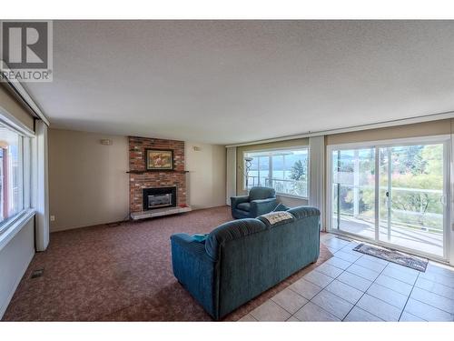 155 Cedar Avenue, Kaleden, BC - Indoor Photo Showing Living Room With Fireplace