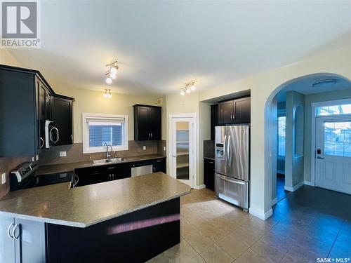 3641 Green Bank Road, Regina, SK - Indoor Photo Showing Kitchen With Double Sink