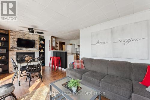 33 Hillcrest Avenue, Kawartha Lakes, ON - Indoor Photo Showing Living Room With Fireplace