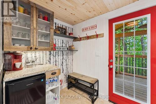 33 Hillcrest Avenue, Kawartha Lakes, ON - Indoor Photo Showing Other Room With Fireplace