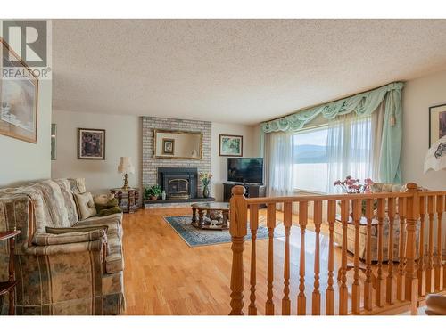 3851 Carnation  Drive, Trail, BC - Indoor Photo Showing Other Room With Fireplace