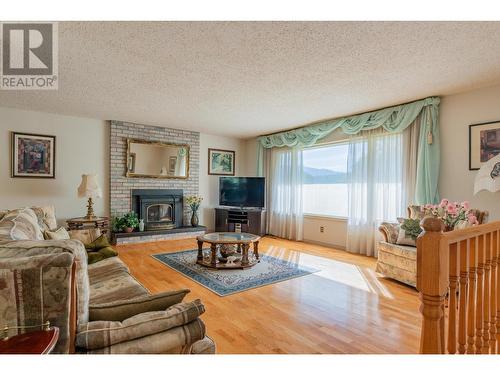 3851 Carnation  Drive, Trail, BC - Indoor Photo Showing Living Room With Fireplace