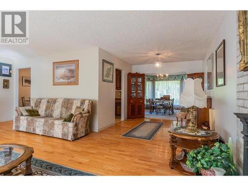 3851 Carnation  Drive, Trail, BC - Indoor Photo Showing Living Room With Fireplace