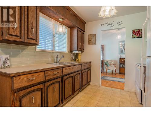 3851 Carnation  Drive, Trail, BC - Indoor Photo Showing Kitchen With Double Sink