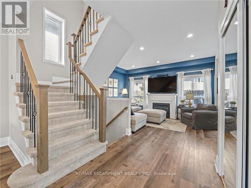 1005 Holdsworth Crescent, Milton, ON - Indoor Photo Showing Other Room With Fireplace