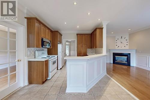 160 Estate Garden Drive, Richmond Hill, ON - Indoor Photo Showing Kitchen With Fireplace