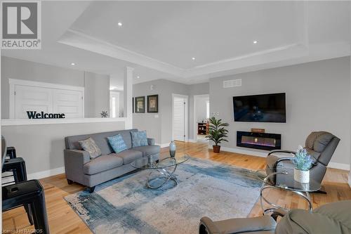 Living room - 207 Carloway Trail, Huron-Kinloss, ON - Indoor Photo Showing Living Room With Fireplace