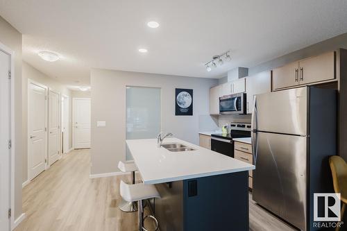 #103 394 Windermere Rd Sw, Edmonton, AB - Indoor Photo Showing Kitchen With Stainless Steel Kitchen With Double Sink