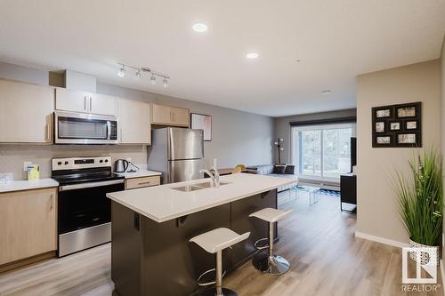 #103 394 Windermere Rd Sw, Edmonton, AB - Indoor Photo Showing Kitchen With Stainless Steel Kitchen With Double Sink