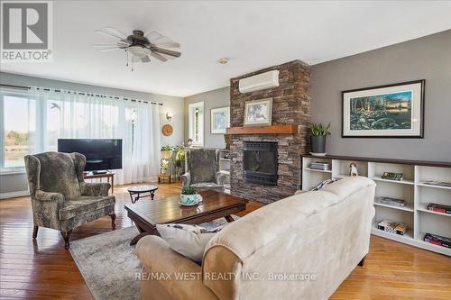 20855 Brunon Avenue, Kawartha Lakes, ON - Indoor Photo Showing Living Room With Fireplace