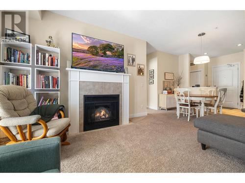 1990 Upper Sundance Drive Unit# 3215, West Kelowna, BC - Indoor Photo Showing Living Room With Fireplace