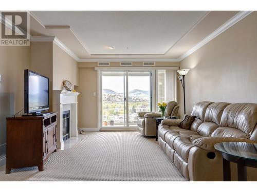 3220 Centennial Drive Unit# 312, Vernon, BC - Indoor Photo Showing Living Room With Fireplace