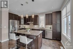 Granite countertops and upgraded extended cabinets - 