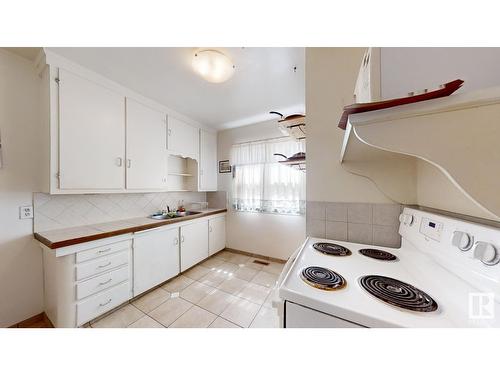 11517 68 St Nw Nw, Edmonton, AB - Indoor Photo Showing Kitchen With Double Sink