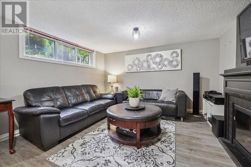 5 Howard Avenue, St. Catharines, ON - Indoor Photo Showing Living Room With Fireplace