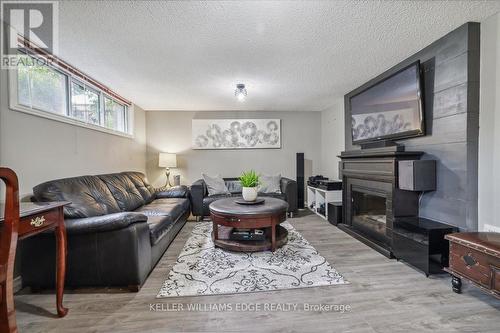 5 Howard Avenue, St. Catharines, ON - Indoor Photo Showing Living Room With Fireplace