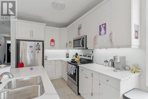 35 - 745 Chelton Road, London, ON - Indoor Photo Showing Kitchen With Double Sink