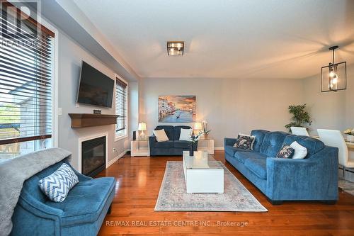 1090 Tupper Drive, Milton, ON - Indoor Photo Showing Living Room With Fireplace