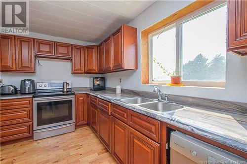 1833 Route 960, Upper Cape, NB - Indoor Photo Showing Kitchen With Double Sink