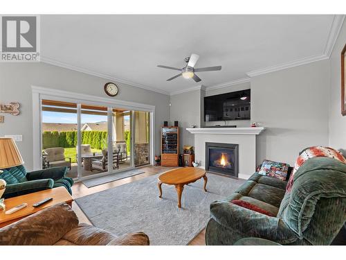 2009 Caroline Way, Westbank, BC - Indoor Photo Showing Living Room With Fireplace