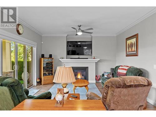 2009 Caroline Way, Westbank, BC - Indoor Photo Showing Living Room With Fireplace