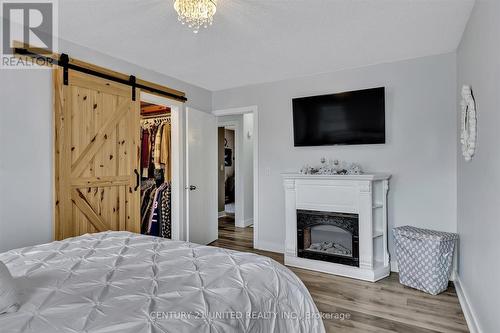 472 Burnham Manor Court, Cobourg, ON - Indoor Photo Showing Bedroom With Fireplace