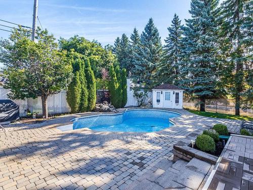 Cour - 2 Rue Du Beaujolais, Kirkland, QC - Outdoor With In Ground Pool