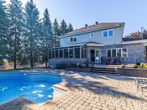 Cour - 2 Rue Du Beaujolais, Kirkland, QC - Outdoor With In Ground Pool With Deck Patio Veranda