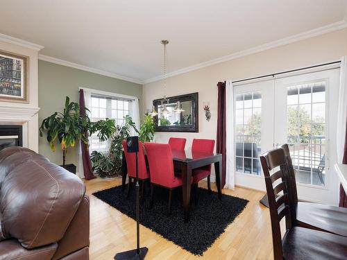 Salle Ã  manger - 5-26 Rue St-Hippolyte, Salaberry-De-Valleyfield, QC - Indoor Photo Showing Dining Room With Fireplace