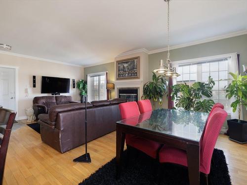 Autre - 5-26 Rue St-Hippolyte, Salaberry-De-Valleyfield, QC - Indoor Photo Showing Living Room With Fireplace